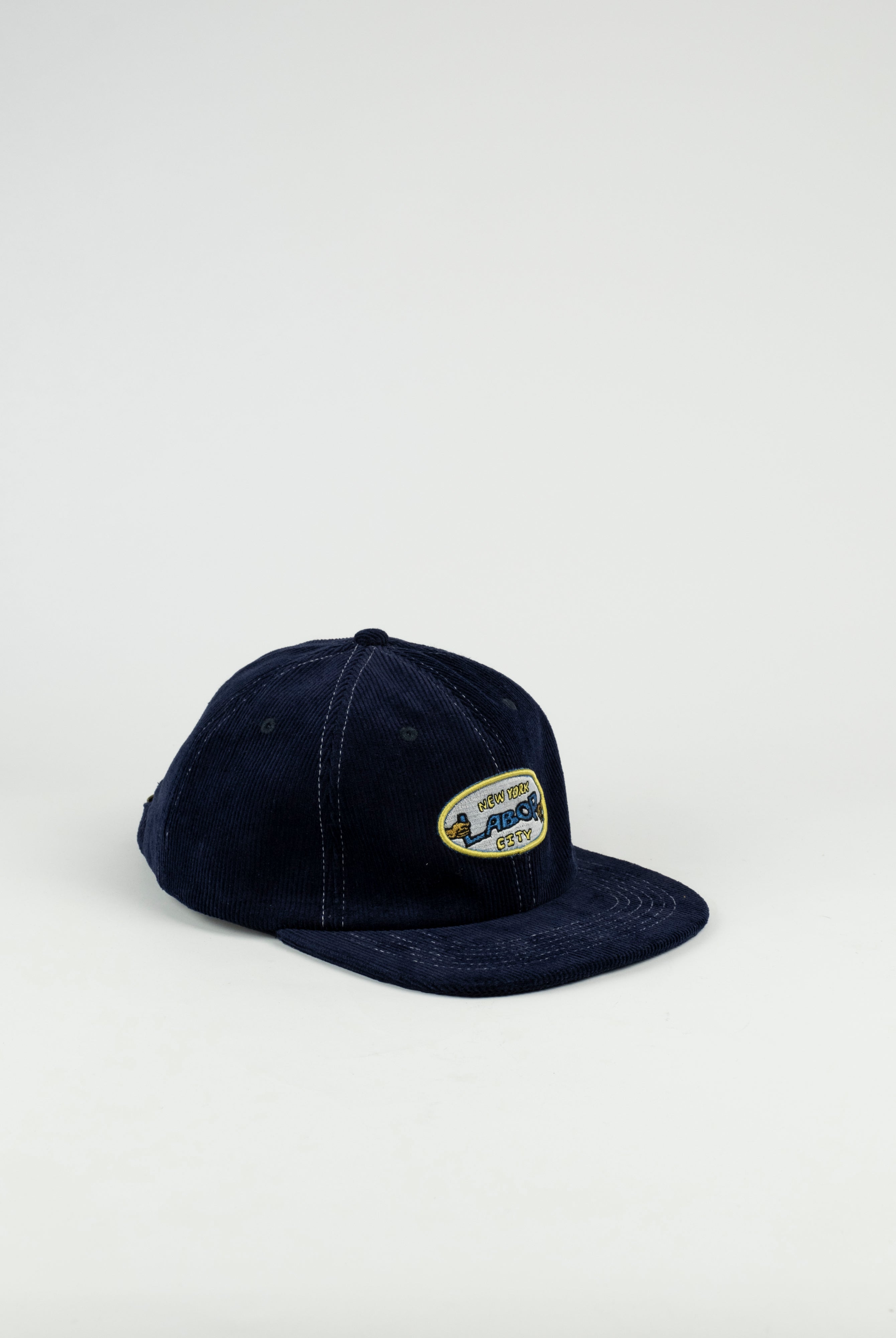 Labor skateshop - pullman cap - navy cord - buckle closed strap back navy blue baseball