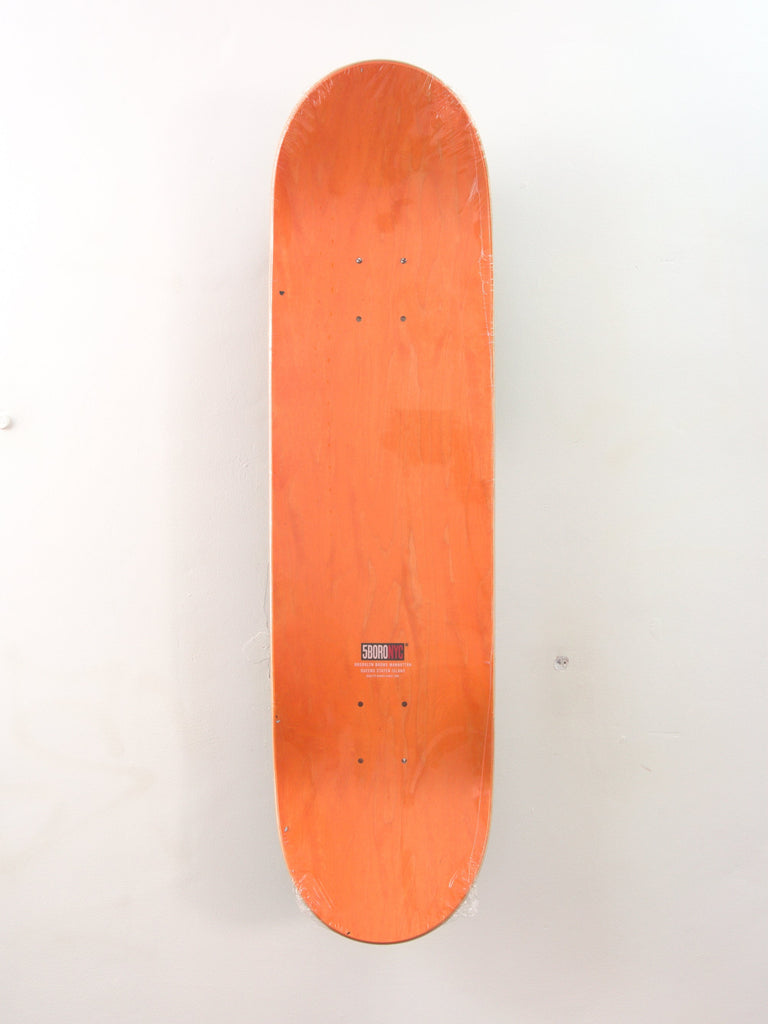 Orange skateboard deck without wheels or trucks.