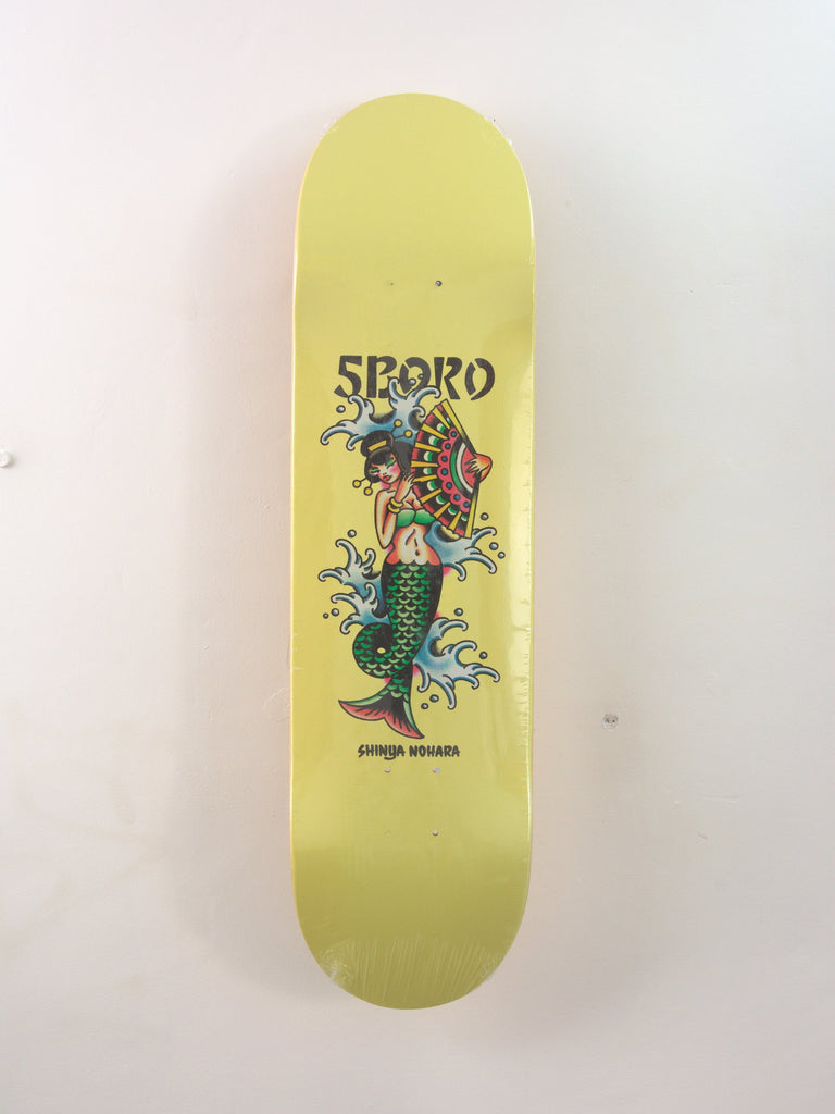 Yellow Shinya Nohara skateboard deck featuring a vibrant mermaid illustration