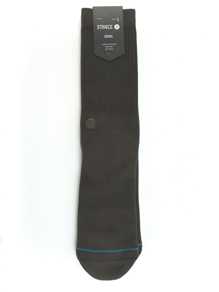 Black dress sock with a blue stripe near the toe.