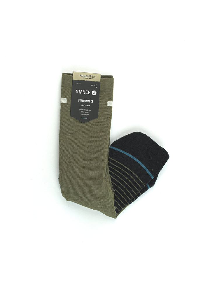 Pair of olive green socks with black striped detailing.