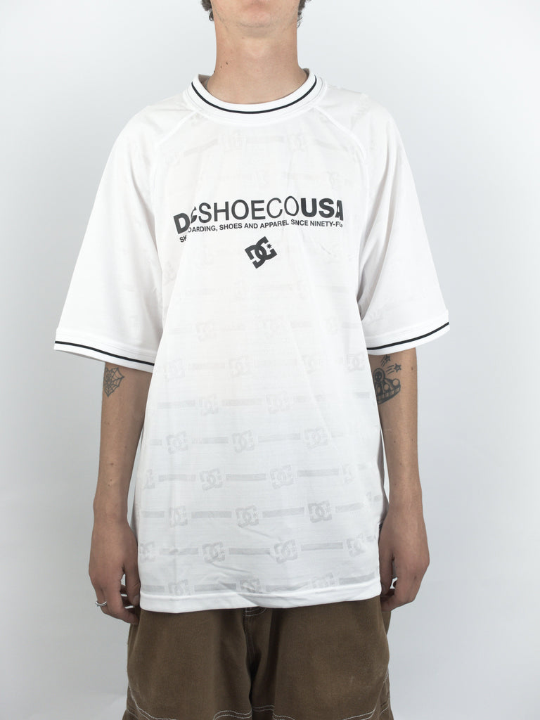 White DC Shoes Super Tour Mesh Jersey T Shirt with logo and black trim on collar