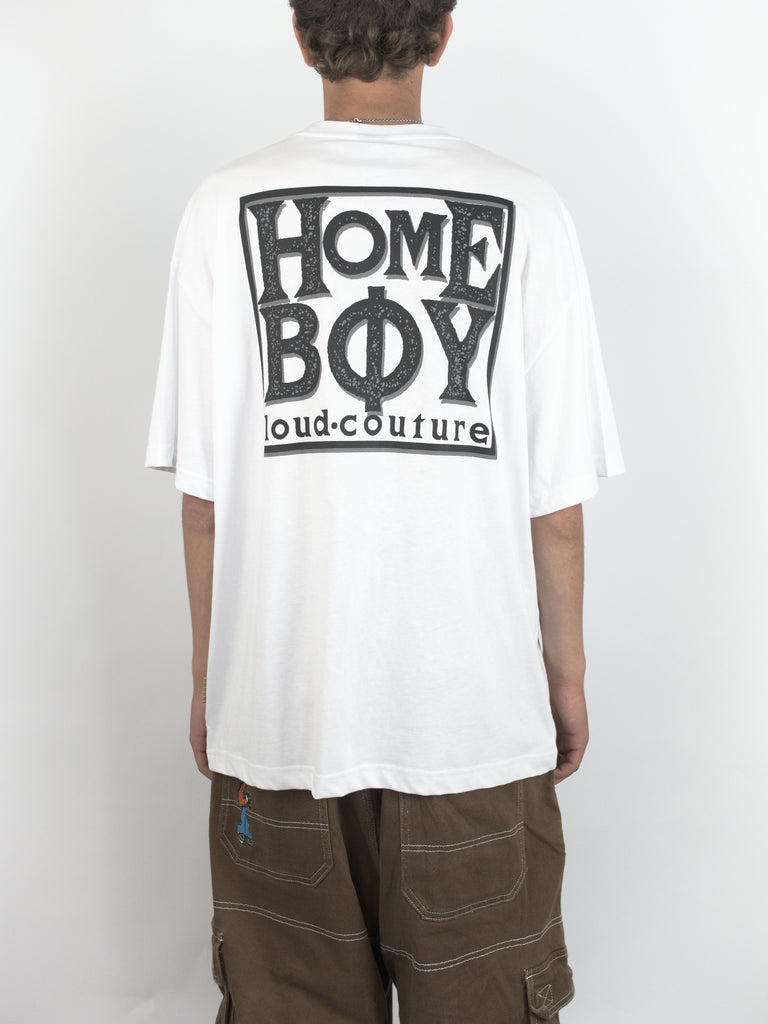 White t-shirt with ’HOMEBOY’ printed in large letters on the back.