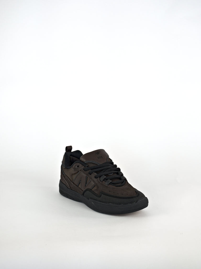 Dark athletic skate shoe with thick sole, featuring Tiago Lemos’ pro design in Coffee/Black