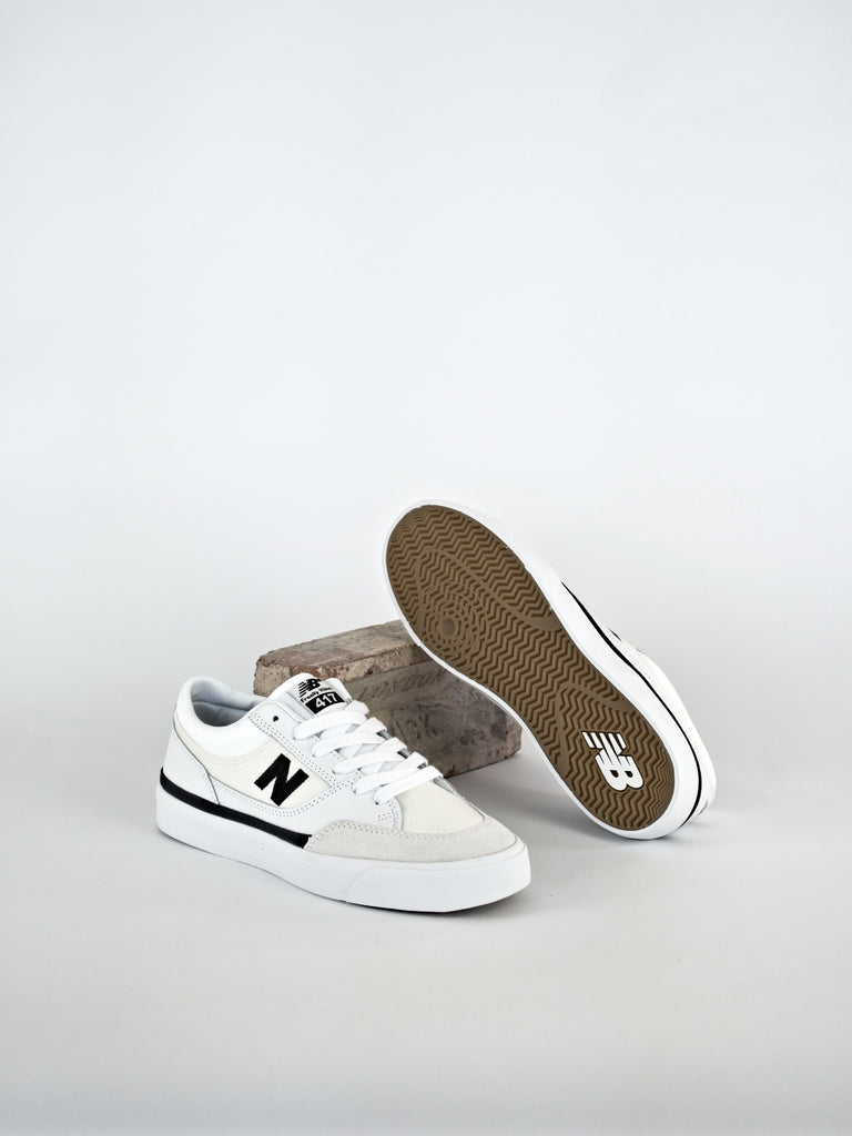 Pair of white New Balance Numeric Frankie Villani Pro skate shoes with black logo detailing