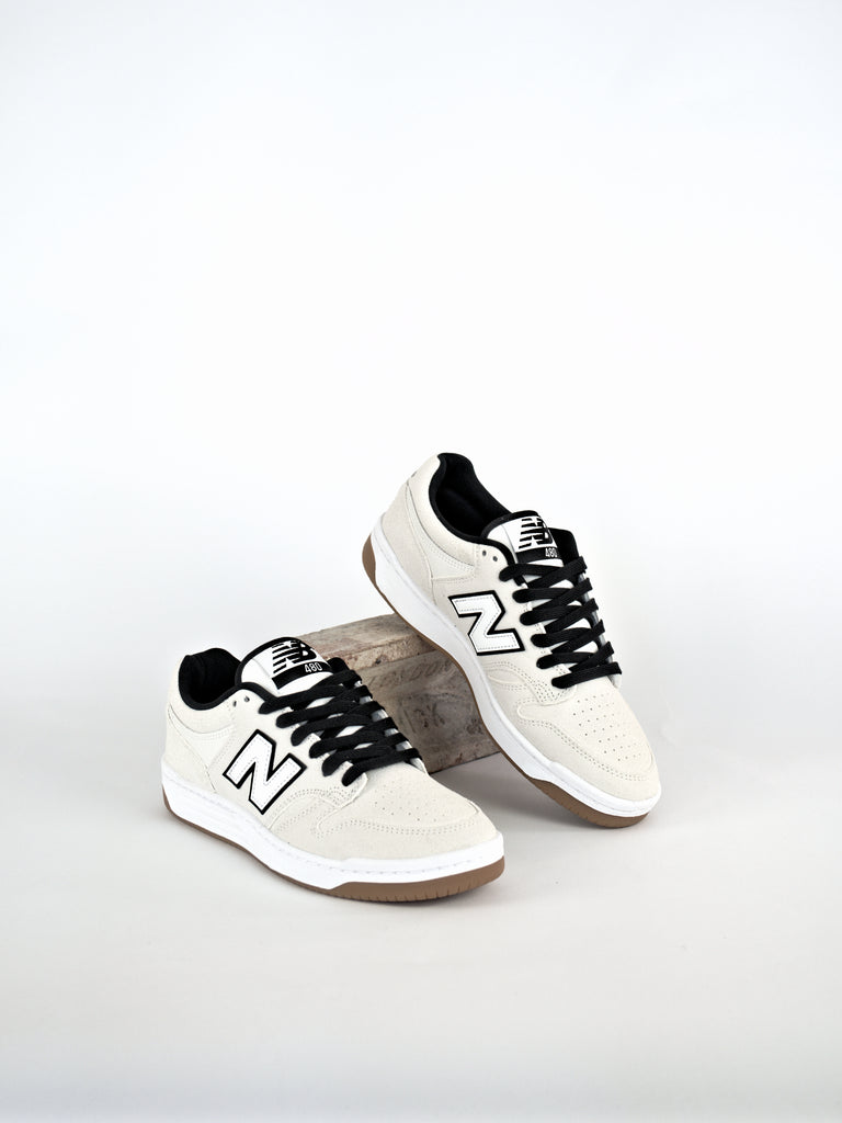 White New Balance Numeric NM 480’s Team Shoe with black laces and trim, ideal for skateboarding