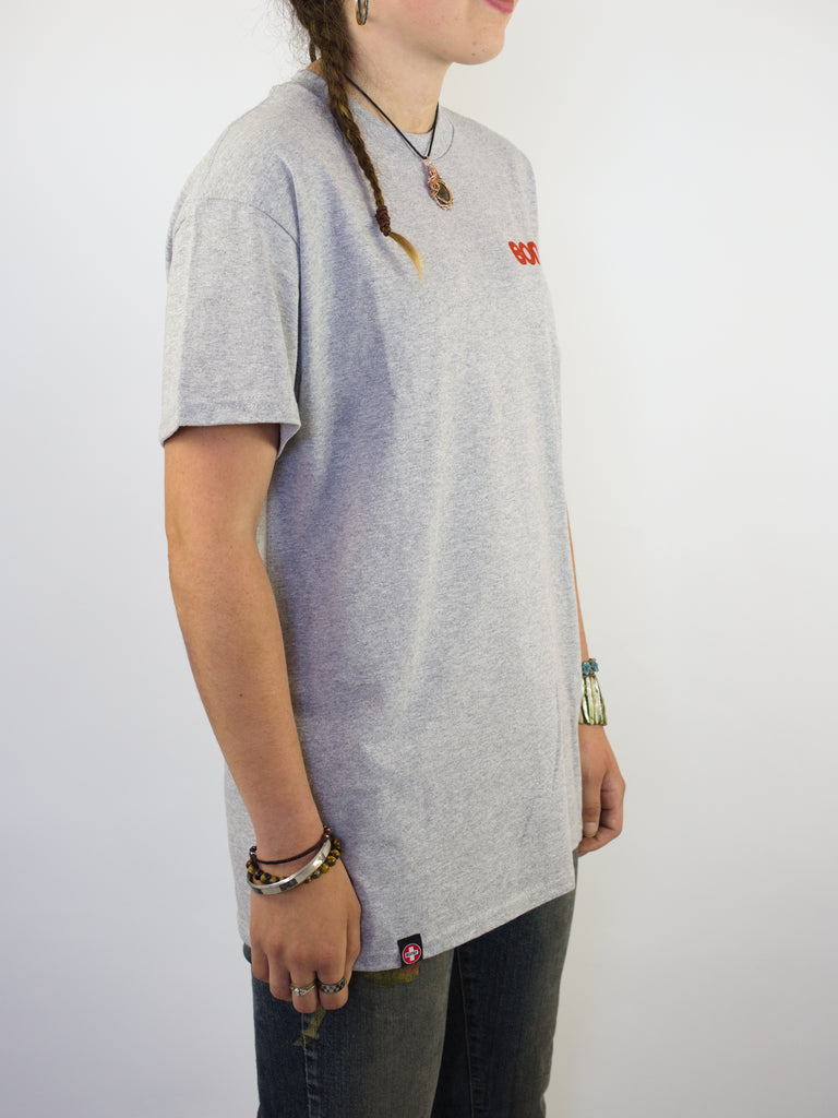 Gray t-shirt with a small red logo on the chest.