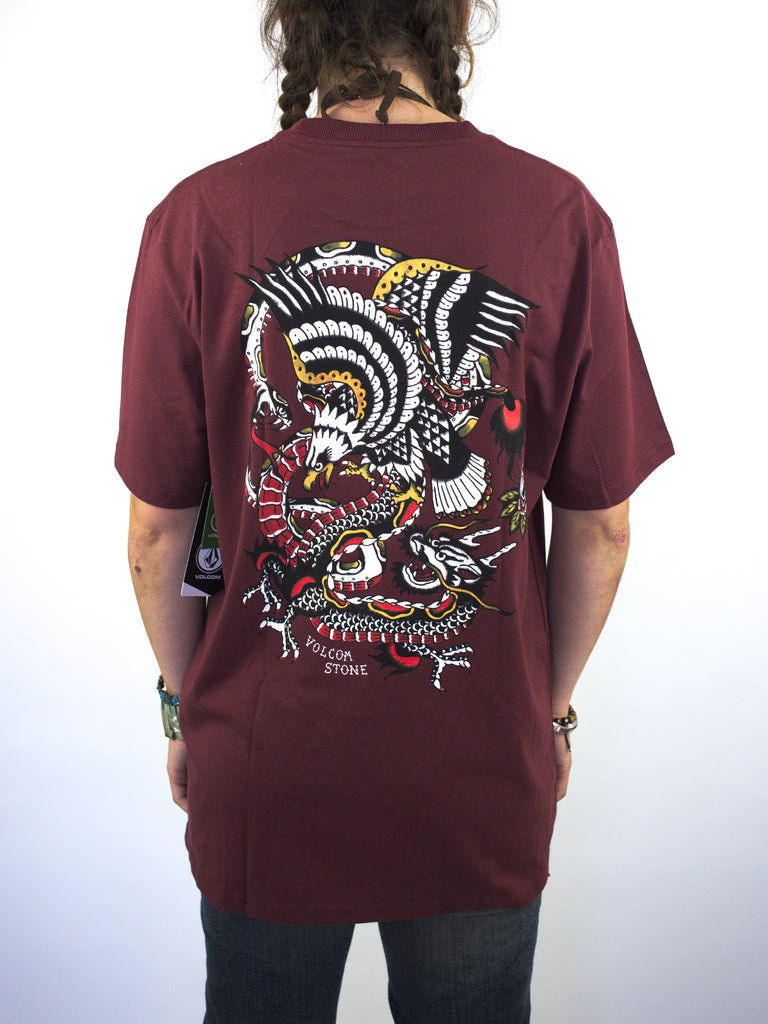 Burgundy t-shirt with a colorful abstract design on the back.