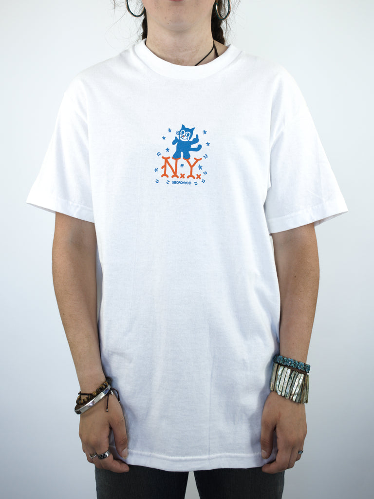 White NYC Cat Tee featuring a vibrant cartoon graphic on the chest in blue and orange