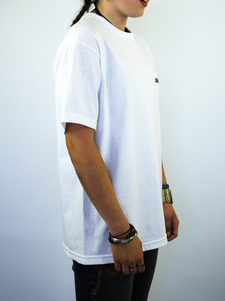 White oversized t-shirt with a small logo on the chest.