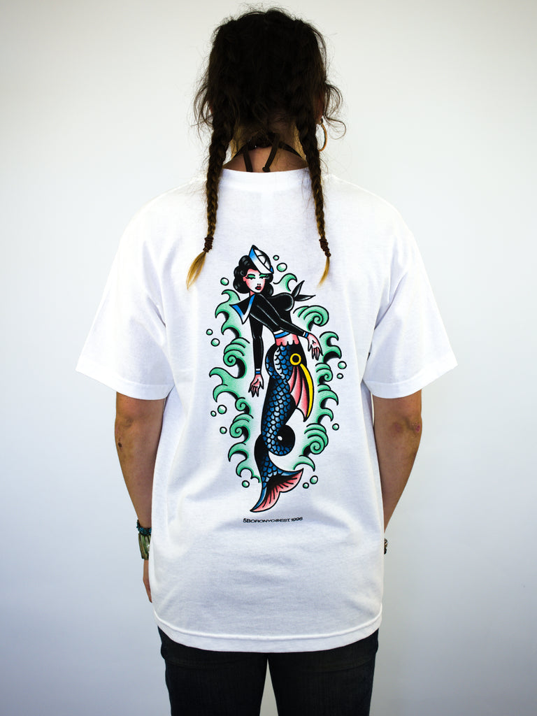 White t-shirt with a colorful mermaid design on the back.