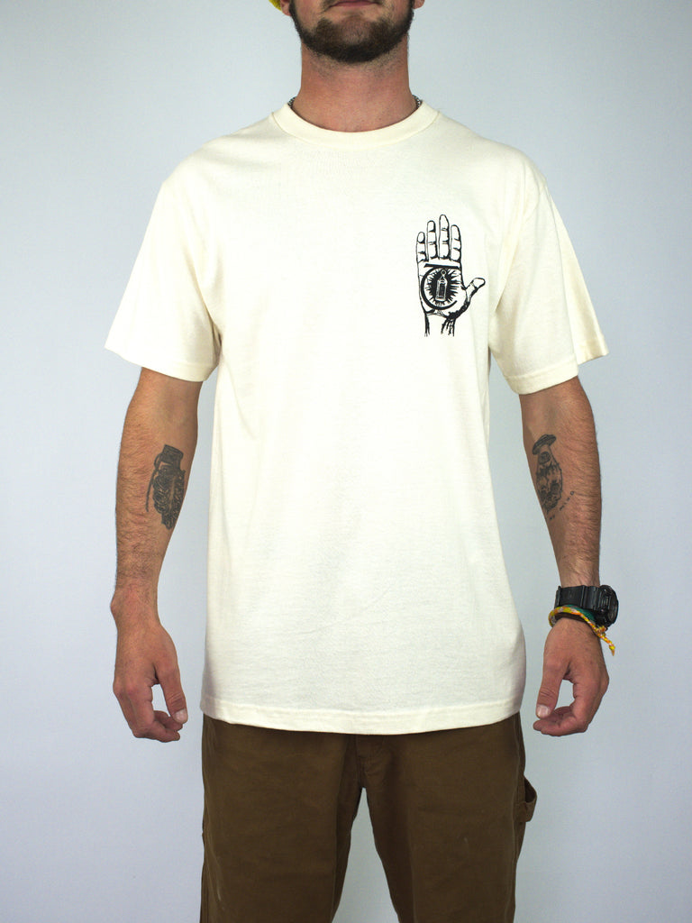 Cream Rasputin Tee featuring hand design graphic on the chest from Theories Of Atlantis