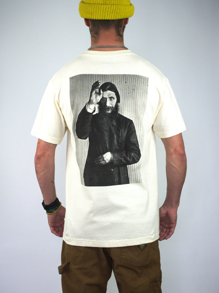 White Theories Of Atlantis Rasputin T Shirt in cream featuring a black and white photograph