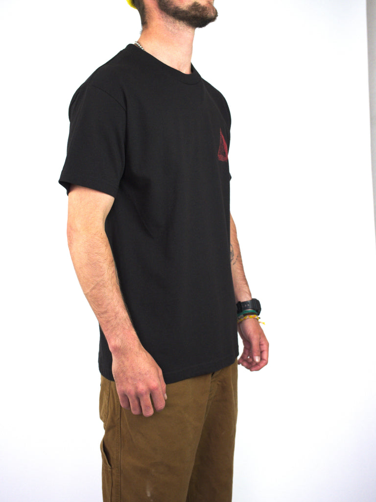 Black tee featuring a small red logo, inspired by Atlantis - Future skateboarding style