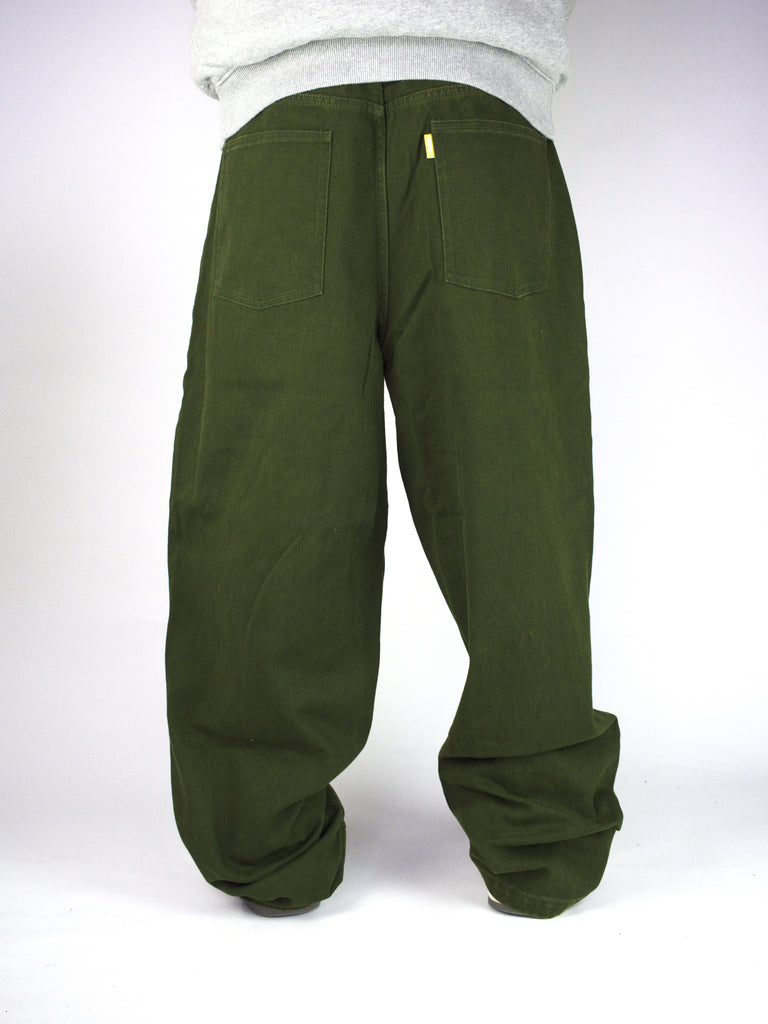 Pair of olive green baggy Plaza Denims in Washed Army Green by Theories of Atlantis