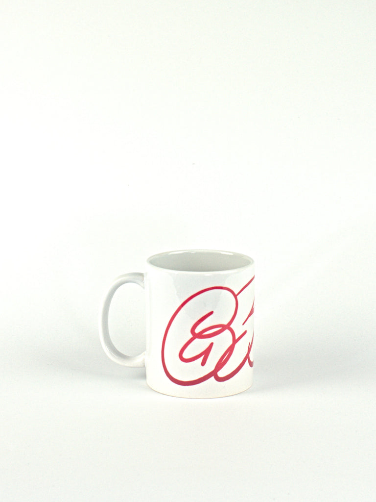 White Grind Supply ceramic coffee mug featuring partial red cursive ’dub Logo’ design