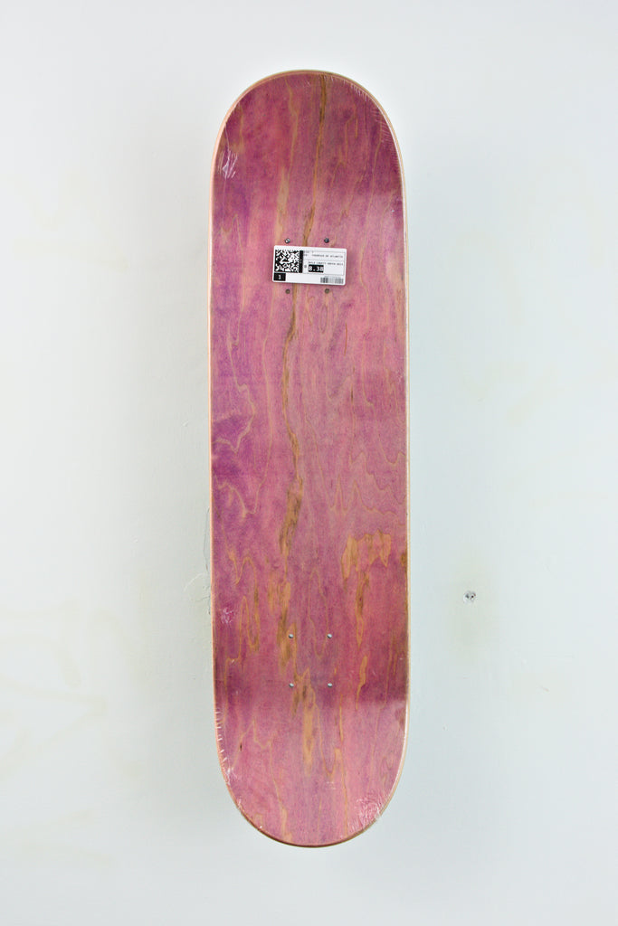 Pink Nyle Lovett Hoffa skateboard deck with a small white label, 8.38 x 31.95