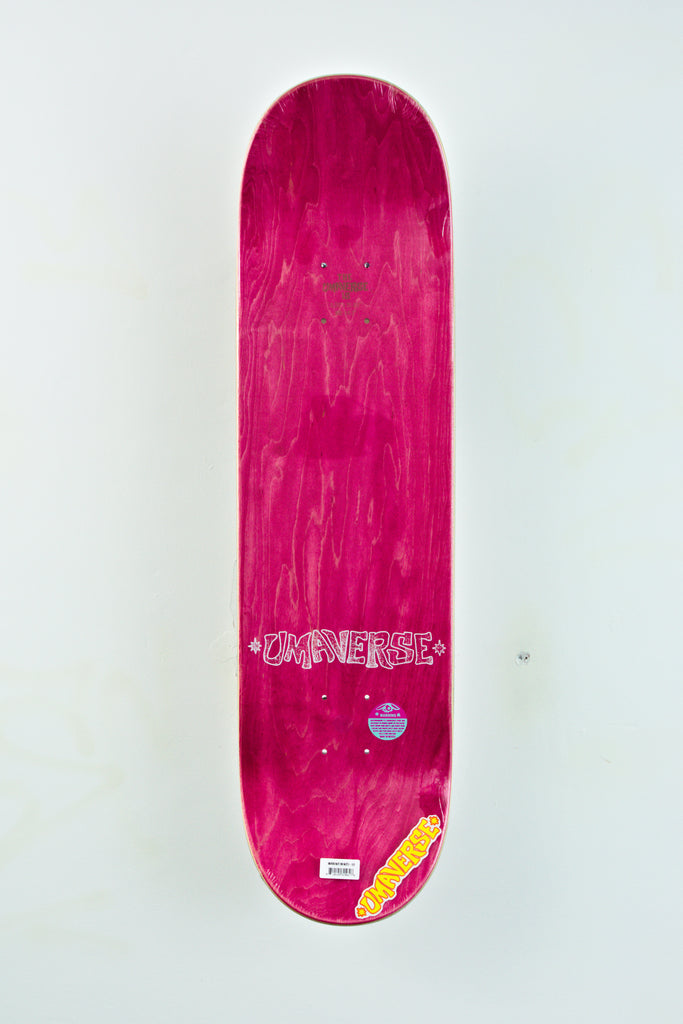 Bright pink Maité Steenhoudt Pro Model skateboard deck with white text and yellow detail