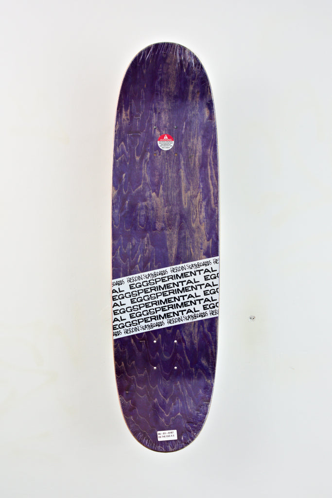 Purple Daniel Shimizu Eggsperimental skateboard deck with white text band, 8.50 x 31.50