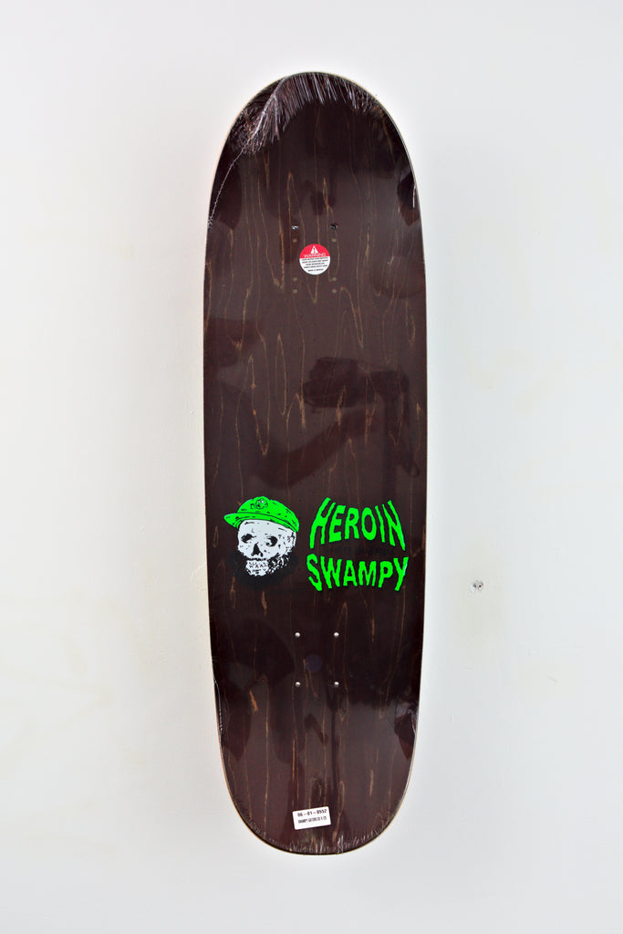 Skateboard deck featuring Heroin Skateboards Gators Swampy Pro Model with skull graphic