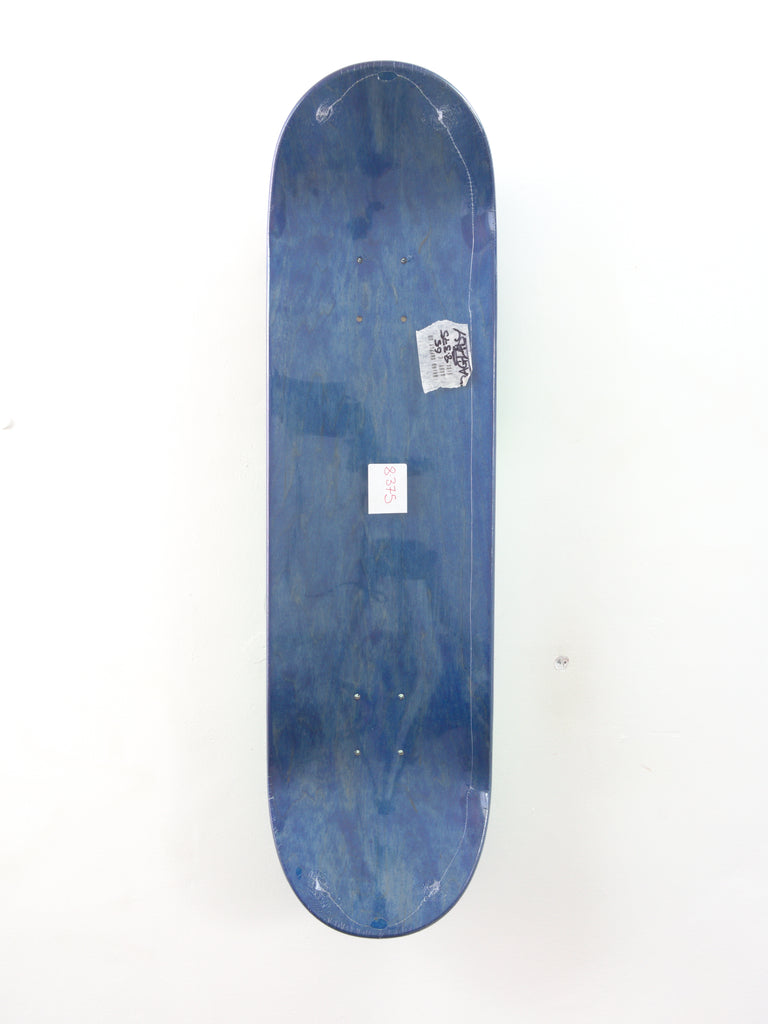 Blue skateboard deck with a small white square and logo sticker.