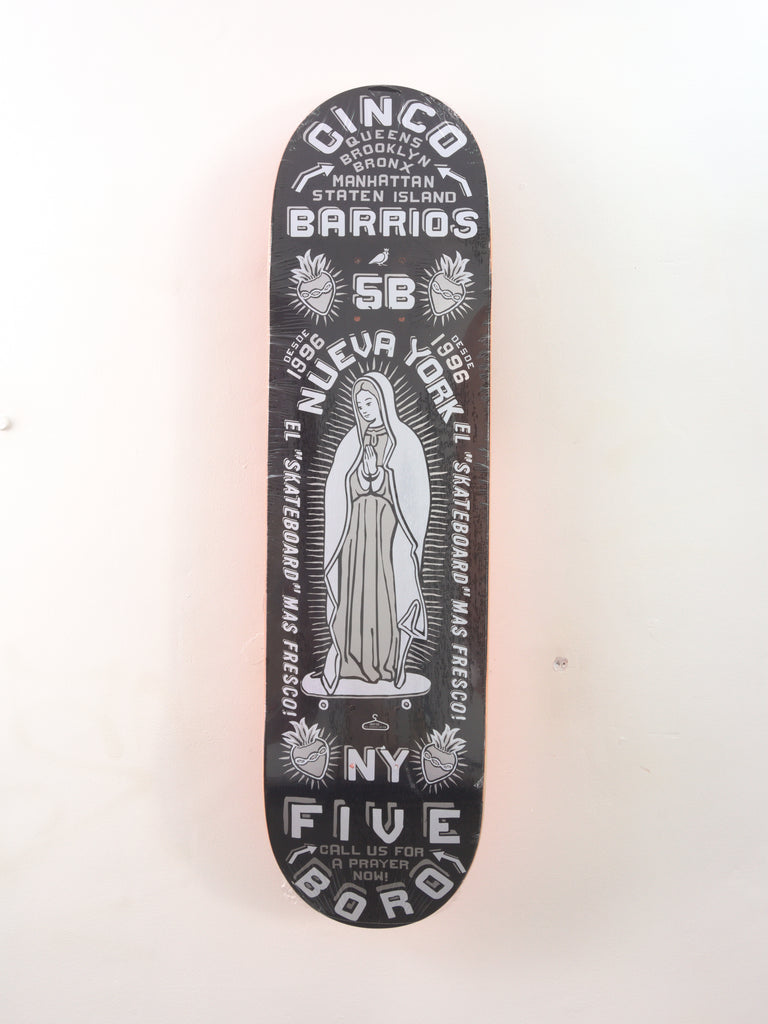 Black and white Cinqo Barrios Skateboard Deck featuring religious imagery and text