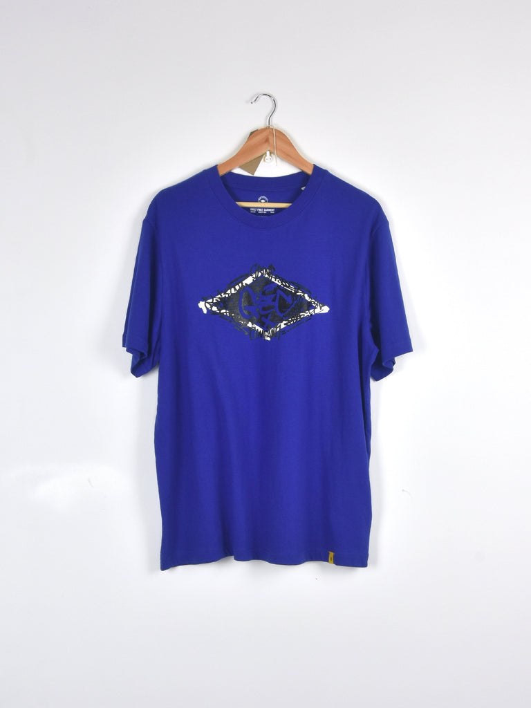 Royal blue t-shirt with a black and white diamond-shaped graphic design on the front.