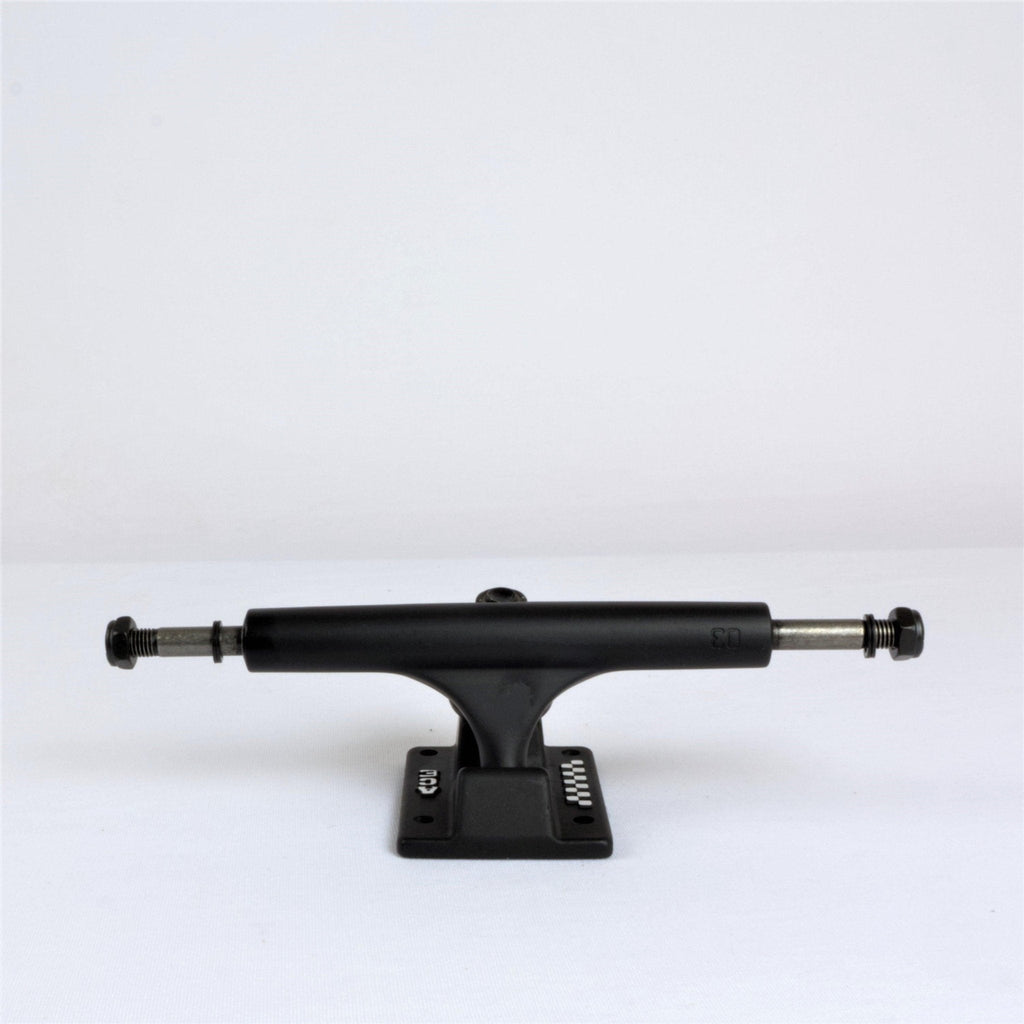 Skateboard truck in matte black finish.