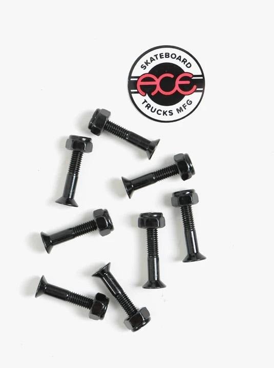 Skateboard truck mounting bolts with a circular Ace Trucks logo above them.