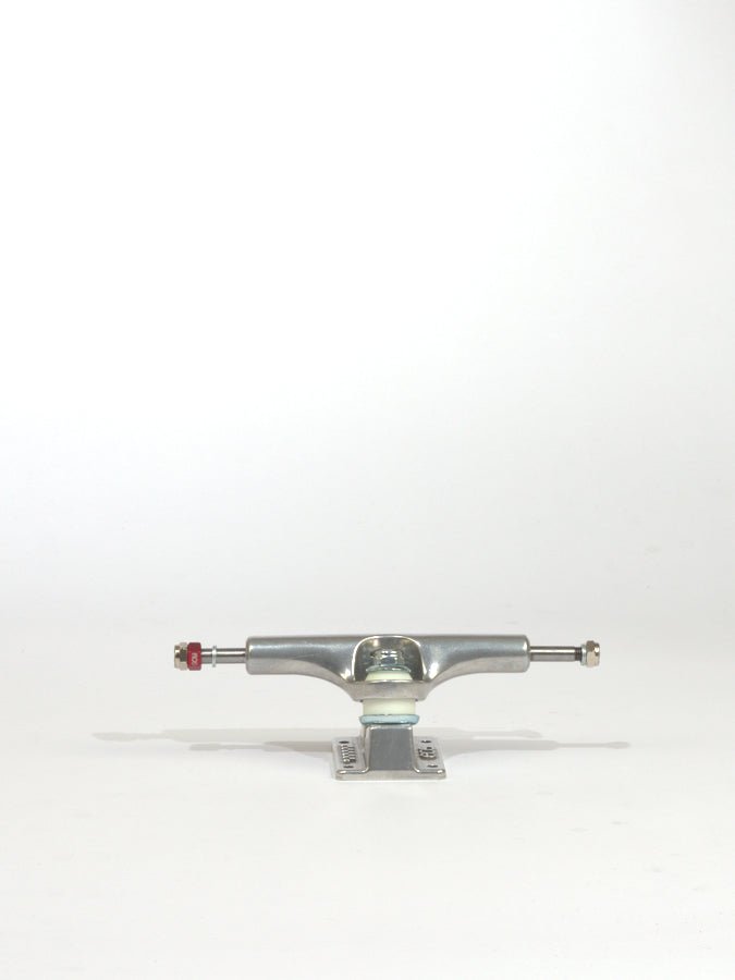 Skateboard truck with a silver metallic finish.