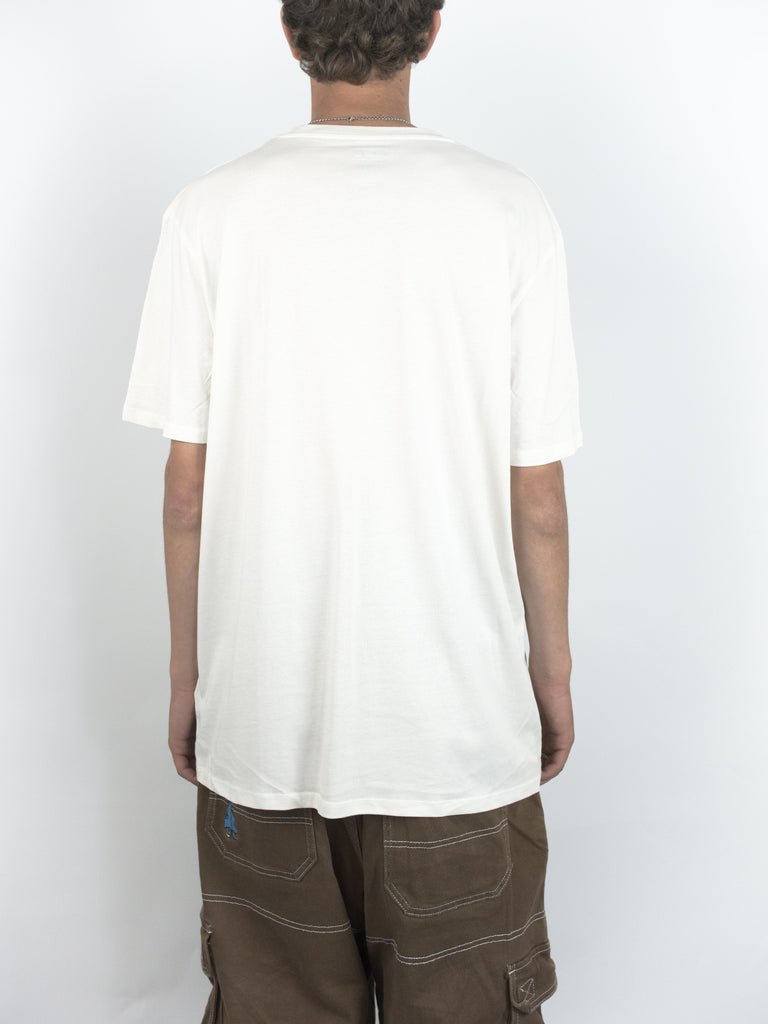 Plain white t-shirt worn by a person showcasing Ace Trucks Rings design from online skateboard shop