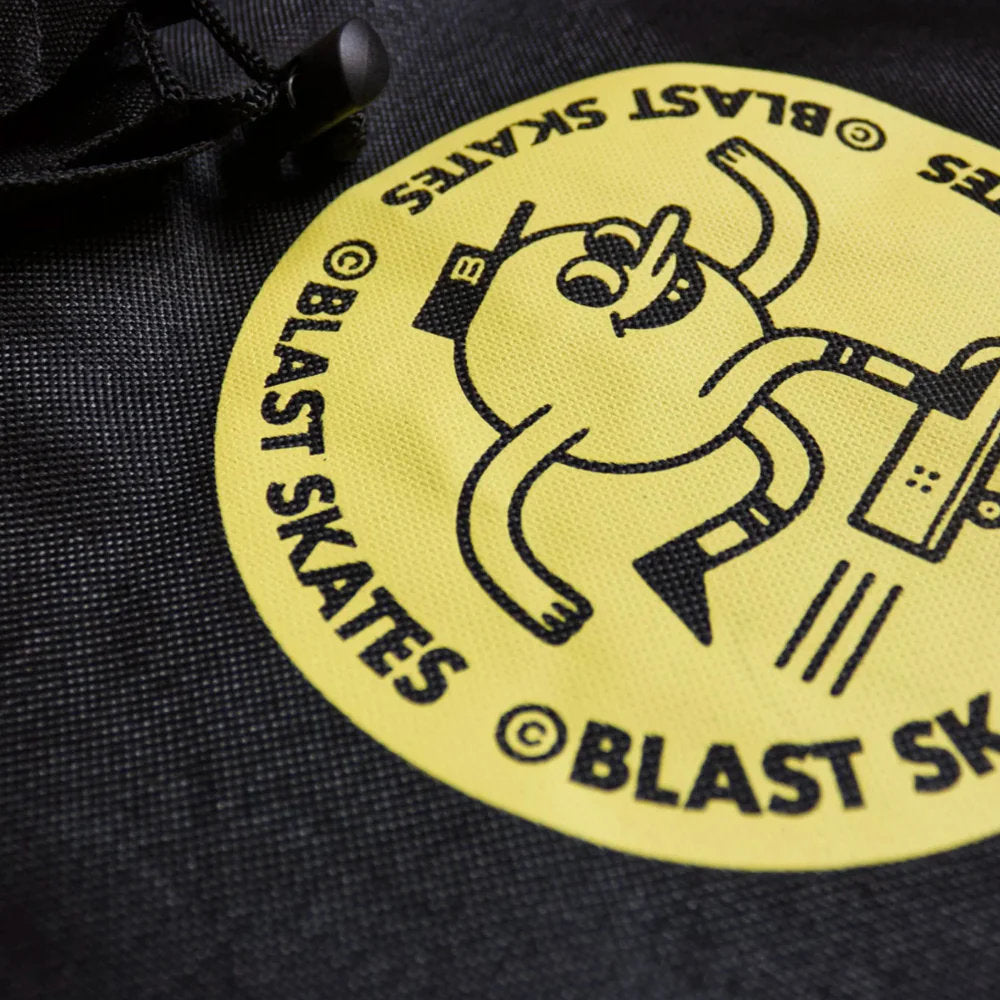 Yellow circular logo with cartoon character and text BLAST SKATES for bike board bag