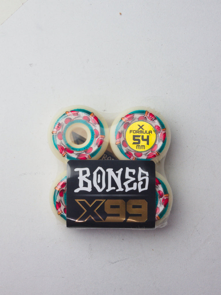 Set of four Bones skateboard wheels with colorful geometric patterns.