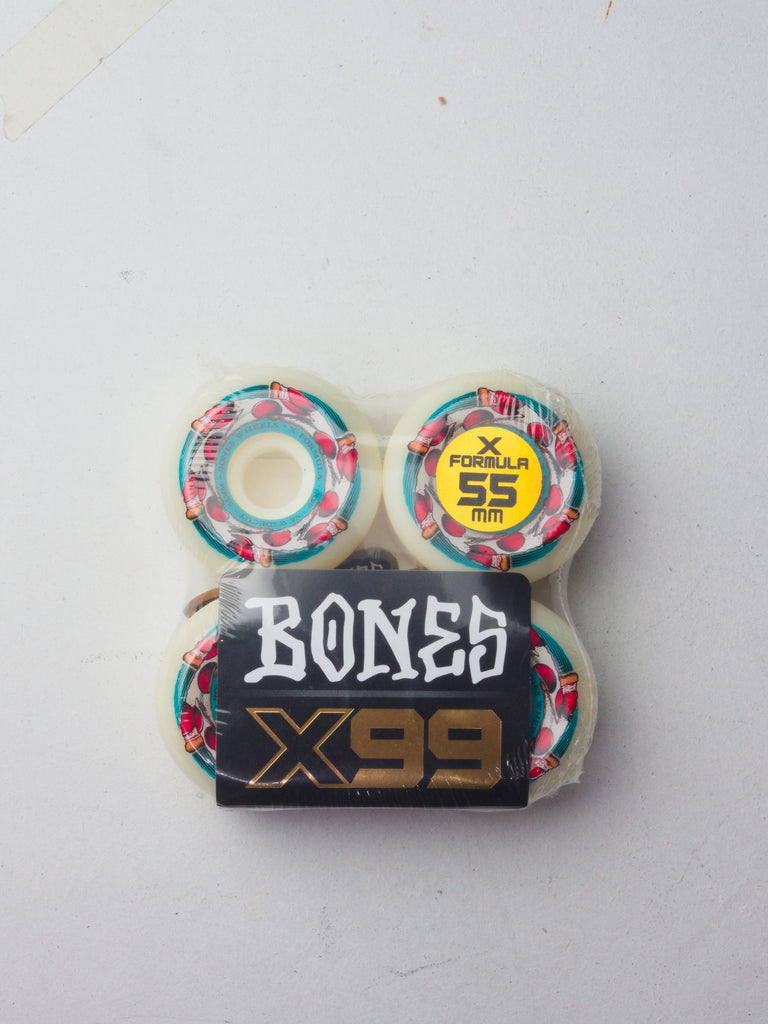 Set of Bones skateboard wheels with colorful geometric patterns and ’X99’’ branding.