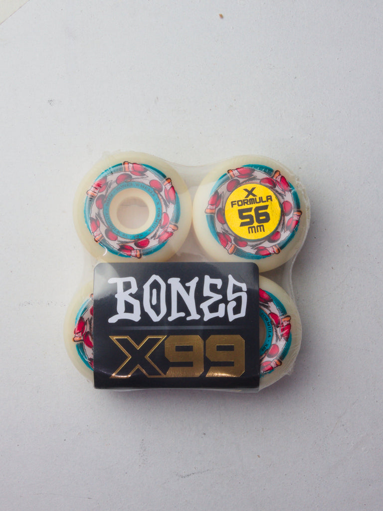 Set of skateboard wheels with colorful geometric patterns and ’BONES X99’’ branding.