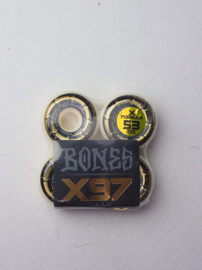 Set of four Bones skateboard wheels with X37 branding.