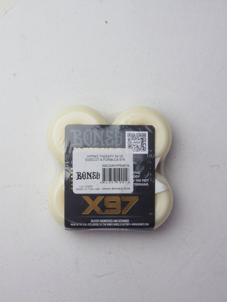 Package of white skateboard wheels with a black label.