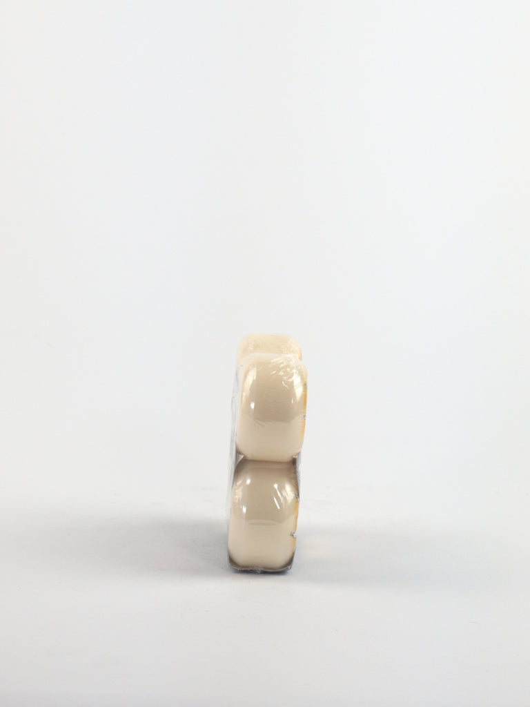 Two white dental crowns stacked vertically for Bones Wheels Runny Bunny Formula V6 Widecut