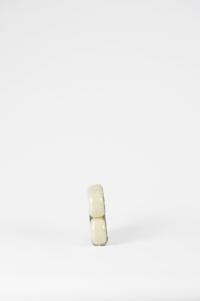 Two white marshmallows stacked vertically.