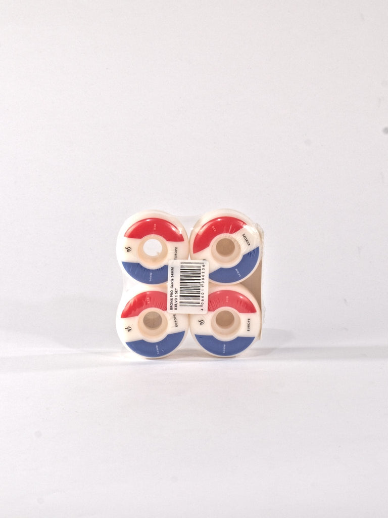 Set of four skateboard wheels with red, white, and blue coloring.