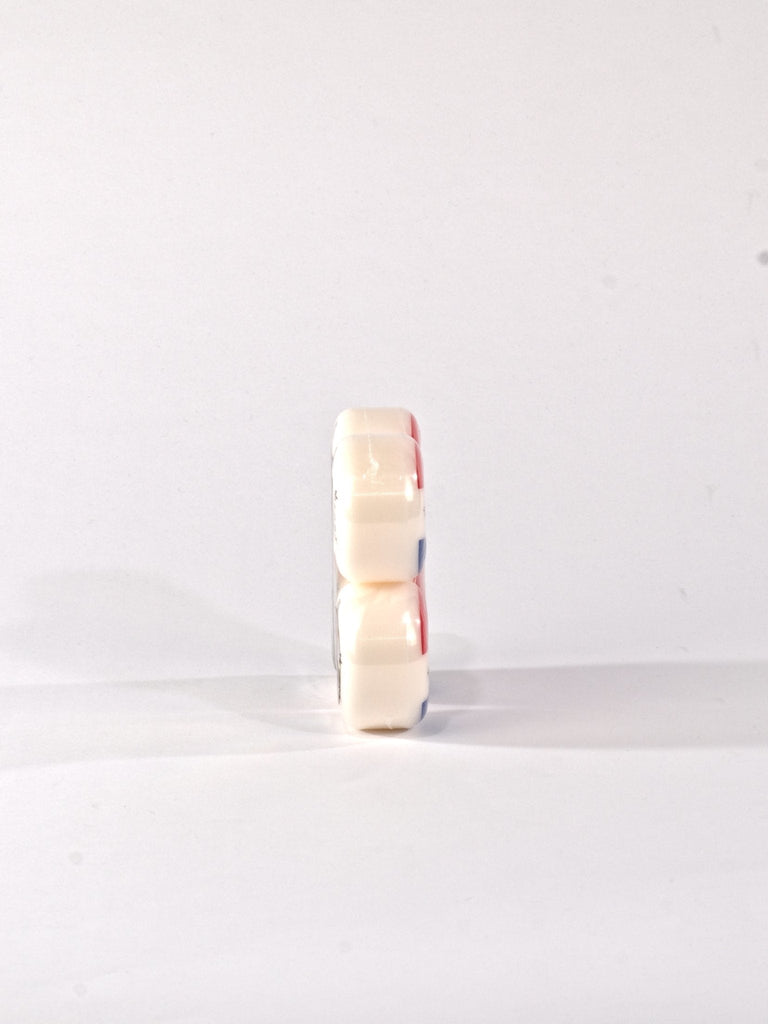 Roll of adhesive tape standing on its edge.