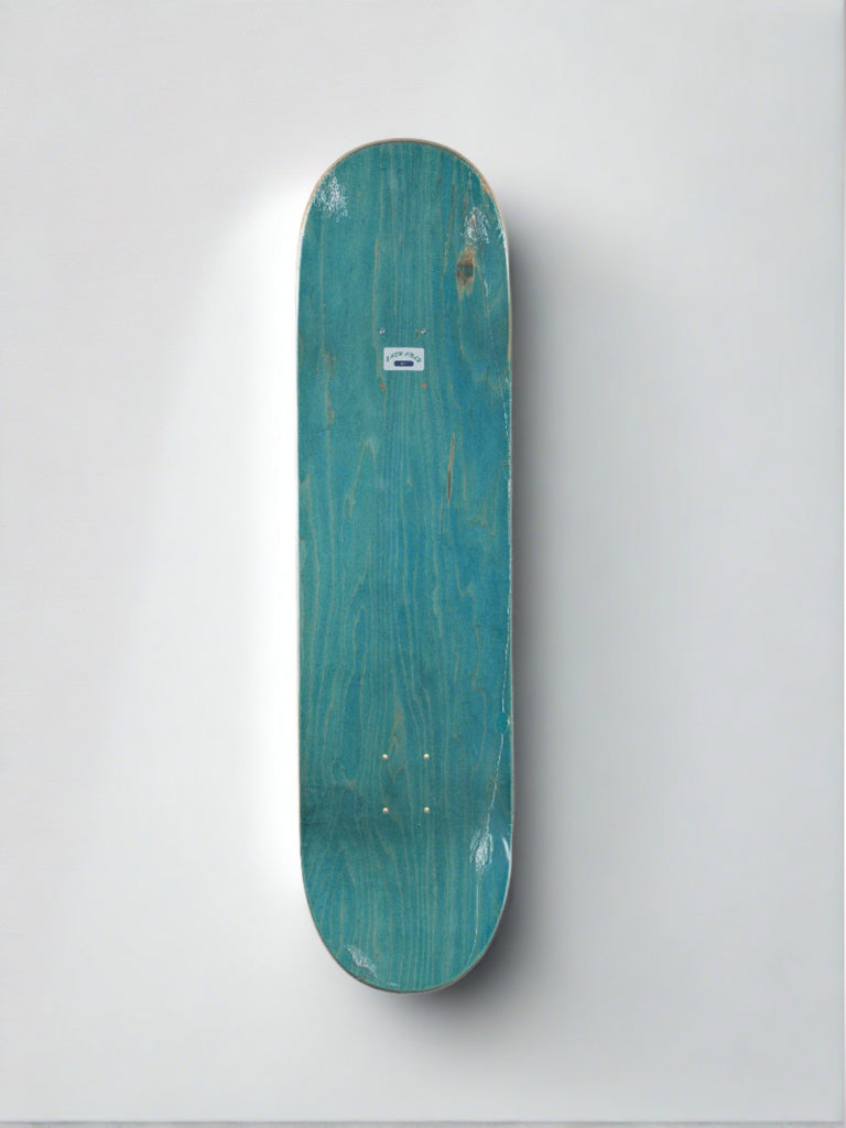 Teal Duck Skateboard Deck showcasing wear, ideal for 90s inspired style at skate parks