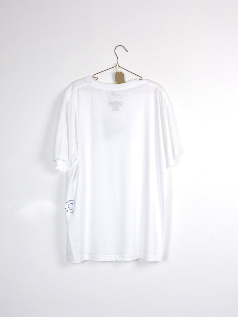 Plain white t-shirt hanging on a wire hanger.