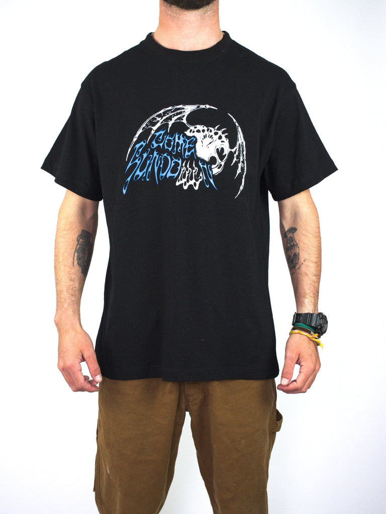 Black t-shirt with a stylized graphic design featuring blue and white elements.