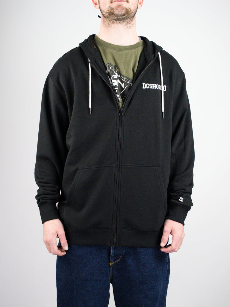 Black zip-up hoodie with a white Hundreds logo on the chest.