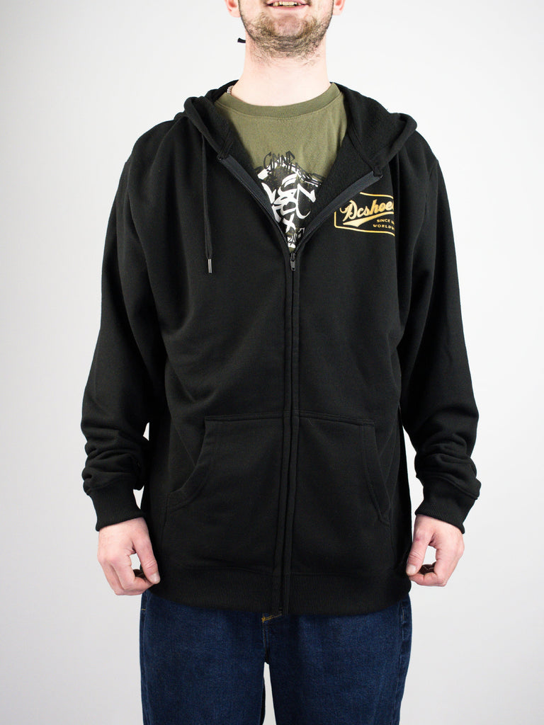 Black zip-up hoodie with a small logo patch on the chest.