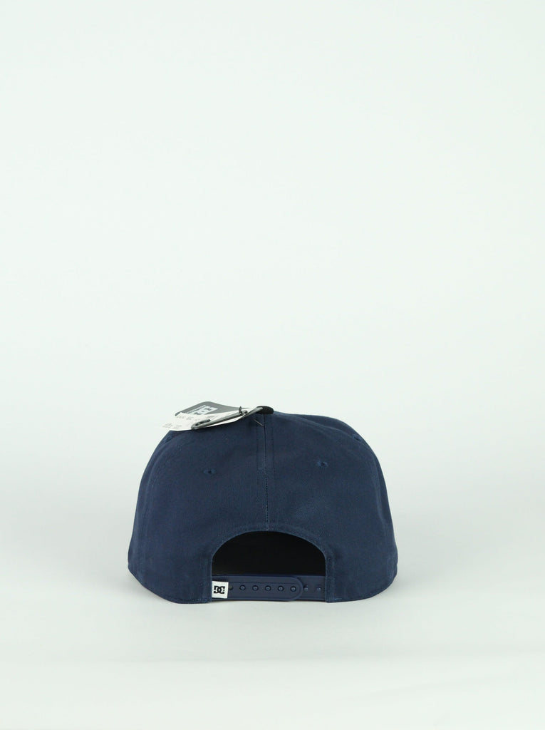 Navy blue snapback cap from Dc Shoes Cut It collection for stylish streetwear look