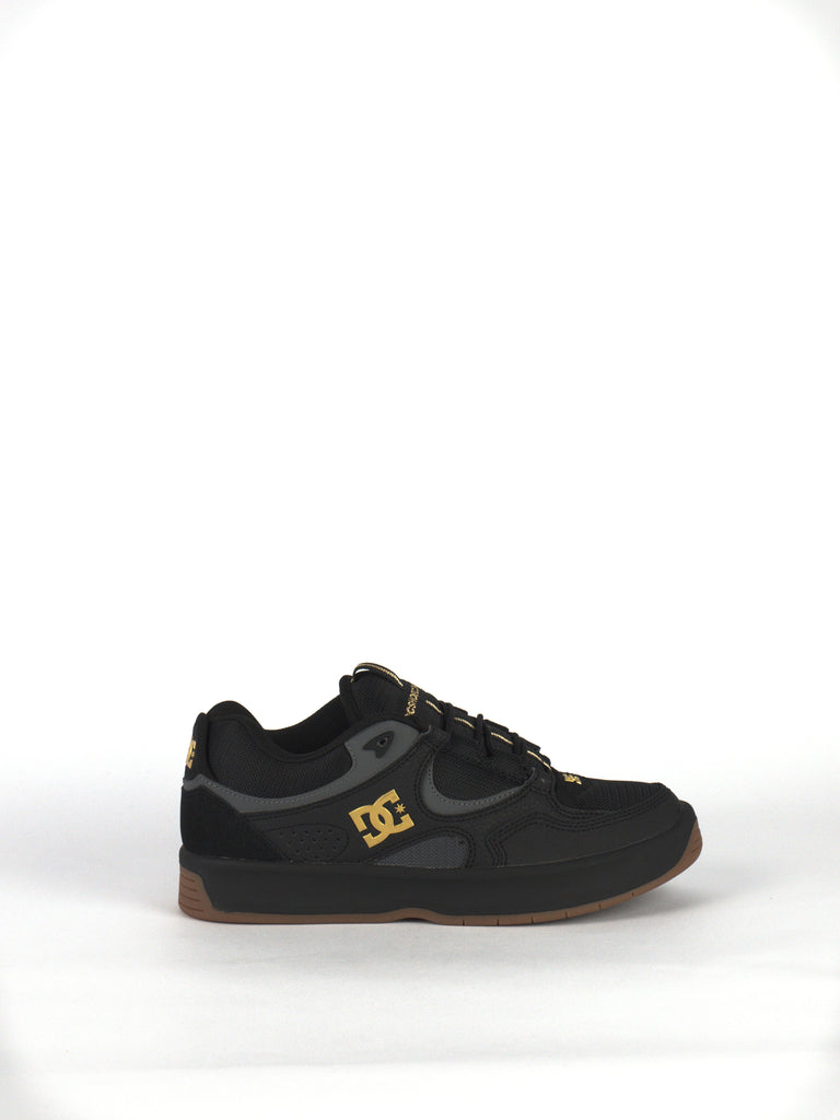 Black DC Kalynx Zero Skate Shoes with yellow logo and gum sole for superior performance