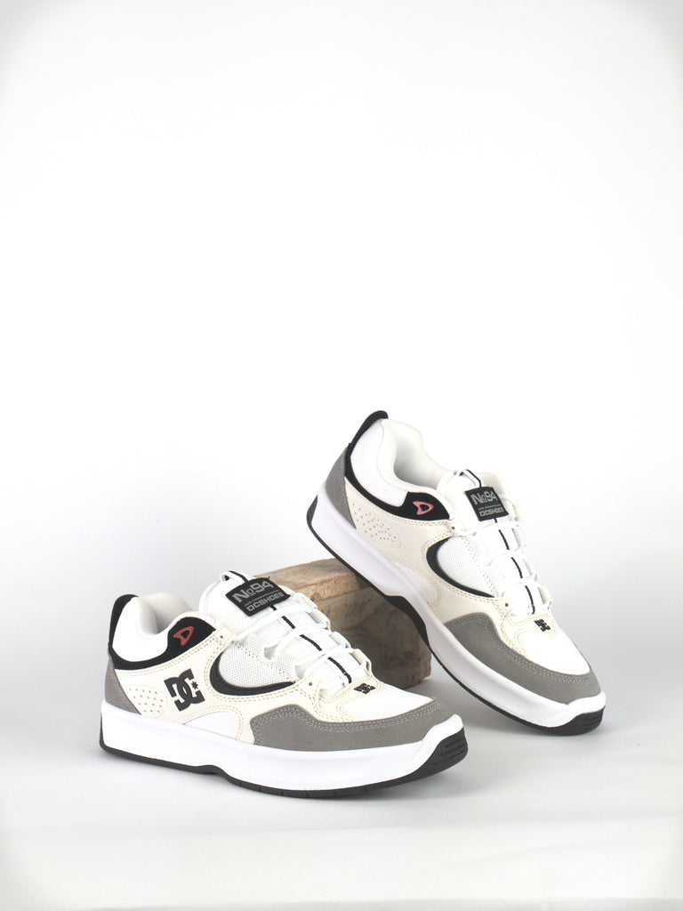 Pair of white and gray DC Kalynx Zero skate shoes for casual wear and performance