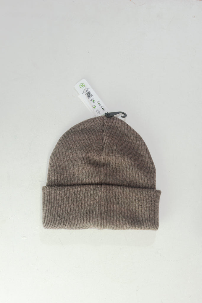 Brown ribbed knit beanie with a folded cuff.